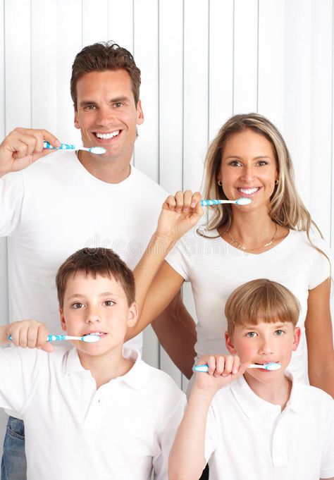 Healthy teeth. Happy family. Father, mother and children with toothbrushes stock photos Free Dental Implants, Emergency Dentist, Family Dentist, Dental Cleaning, Family Dentistry, Pediatric Dentistry, Stained Teeth, Best Dentist, Dental Services