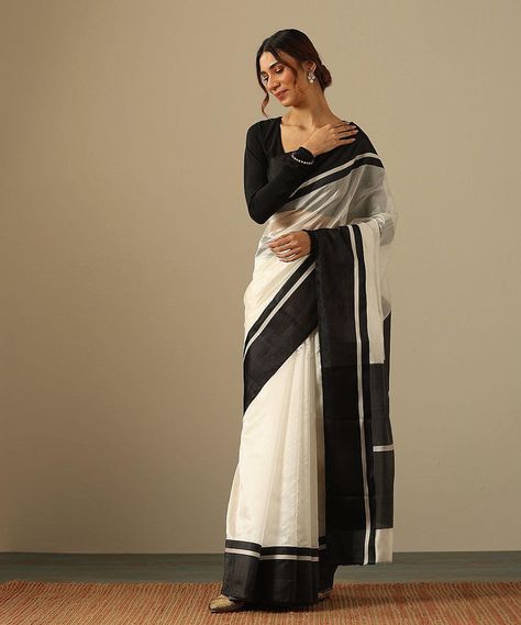 If the quiet luxury era has anything to say, it's that perennial styles like an iconic black and white saree will forever have a spot in our hearts and in our wardrobes.� Featured here is our White Handloom Pure Silk Chanderi Saree With Black Mashroo Border. This saree with its 'Ek Naliya' weave offers a delicate texture that gracefully envelops the wearer.� Explore our new edit of Chanderi Sarees online at www.weaverstory.com or at our stores For appointments, Call/ Whatsapp: +91 981064634... White And Black Saree, Black And White Saree, Chanderi Sarees, Chanderi Saree, White Saree, Aishwarya Rai Bachchan, Black Saree, Kanchipuram Saree, Aishwarya Rai