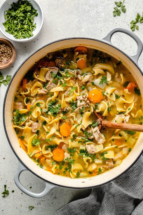 Leftover Turkey Noodle Soup is the perfect way to use up and repurpose those delicious holiday leftovers. Turn your leftover roasted turkey into a delicious and cozy soup that everyone will love. Leftover Turkey Noodle Soup, All The Healthy Things, Turkey Stew, Leftover Turkey Soup, Turkey Noodle Soup, Turkey Holiday, Turkey Soup Recipe, Cozy Soup, Holiday Leftovers