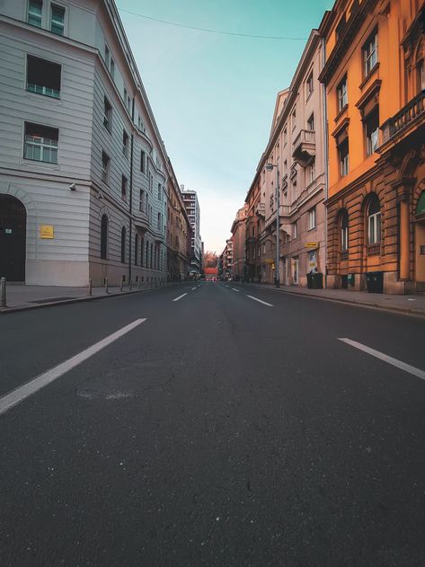 concrete road in middle of buildings during daytime photo – Free Building Image on Unsplash Road Background, Editing Skills, Road