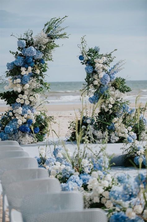 A wedding is a tapestry of love, woven together with unique details and personal touches. For couples seeking an unconventional yet timeless theme, the color blue offers a perfect palette to create an atmosphere of serenity, sophistication, and enduring love. Hydrangeas Wedding Arch, Blue And White Arch Wedding, Blue And White Flower Arch, Blue Hydrangea Wedding Decorations, Marseille Blue Wedding, Sky Blue Wedding Decor, Hydrangea Wedding Arch, Blue Wedding Arch, Sky Blue Weddings