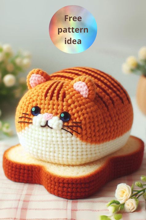 Crochet this adorable cat loaf amigurumi sitting on a bread slice! Perfect for quirky decor or gifts. Beginner-friendly with easy-to-follow instructions. Loaf Cat, Cat Loaf, Quirky Decor, Crochet Cat, Cat Pattern, Stuffed Animal Patterns, Crochet Animals, Yarn Crafts, Cute Crochet