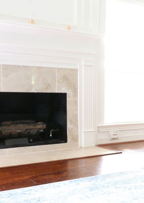 How to tile over an existing fireplace surround - My Woodlands Life Changing Tile Around Fireplace, Traditional Fireplace Tile Ideas, Plaster Over Tile Fireplace, Tile Fireplace Hearth, Tile Surround Fireplace, Paint Fireplace Tile, Tile Around Fireplace, Marble Hearth, Hearth Tiles