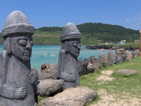 Jeju Island's iconic stone sculptures, the Dol Hareubang, can be seen on tourist trinkets and goods all over South Korea. But what are they, and why were they built? Here's a quick guide to the island's most mysterious guardians. Hamdeok Beach, Patriarchal Society, Mushroom Culture, Jeju City, Jeju Island South Korea, Stone Sculptures, To Be A Woman, Car Tour, Jeju Island