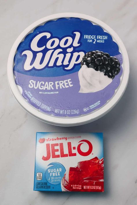 This two ingredient sugar free strawberry fluff is a tasty low calorie dessert! Only 60 calories for a 1/2 cup serving! Strawberry Jello and cool whip combine to make a creamy and comforting dessert. #dessert #lowcaloriedessert #pinkdessert Jello And Cool Whip, Jello With Cool Whip, Strawberry Fluff, Cool Whip Desserts, Sugar Free Jello, Sugar Free Recipes Desserts, Eating Too Much, Sugar Free Pudding, Weight Watchers Recipes Desserts