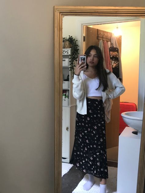 Midi Skirt Outfit Cardigan, Floral Midi Skirt Outfit Aesthetic, White Floral Midi Skirt Outfit, Floral Skirt And Cardigan Outfit, Midi Skirt With Cardigan Outfit, Floral Maxi Skirt Outfit Fall, Cardigan Long Skirt Outfit, Long Skirt And Cardigan Outfit, Floral Long Skirt Outfit