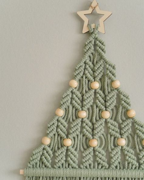 BeanDaikon Macrame on Instagram: "🎄 Allow us to present our "Boho Christmas Tree" 🌟! This charming creation blends the holiday magic with contemporary artistic vibes. It brings a rustic, cozy ambiance to your winter home decor 🏡❄️. The macrame design sets it apart, making it not just a festive holiday tree but also a chic addition to your nursery's wall art collection 🎨👶. 👉 Message us now! #macramewallart #bohovibe #handmadecurator #walldecorations #macrameknots #homedecoratingideas #handcraft Large Macrame Christmas Tree, Macrame Christmas Tree, Boho Christmas Tree, Winter Home, Cozy Ambiance, Macrame Wall Art, Wall Art Collection, Boho Christmas, Macrame Knots