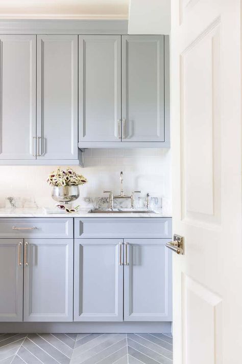 Blue Laundry Room Cabinets, Light Blue Laundry Room, Chevron Pattern Floor, Blue Laundry Room, Blue Gray Kitchen Cabinets, Transitional Laundry Room, Blue Kitchen Designs, Grey Blue Kitchen, Blue Laundry Rooms