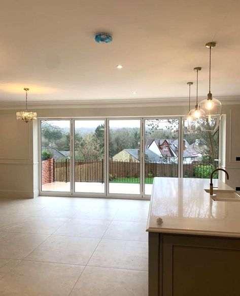 Another recently installed set of 5 panel bifold doors, finished in white! 💫⁠
⁠
The crisp, clean lines of the doors look perfect paired with the red brick, whilst working perfectly with the soft interior scheme. Allowing so much light to flood the extension, they are a wonderful choice all year long. In the Summer, they are the perfect way to extend the living space with the outdoors.☀️⁠ Kitchen With Bifold Doors, Kitchen Bifold Doors, Bifold Doors Kitchen, Bi Folding Doors Kitchen, White Bifold Doors, Bi Folding Doors, Roof Lantern, German Style, French Windows