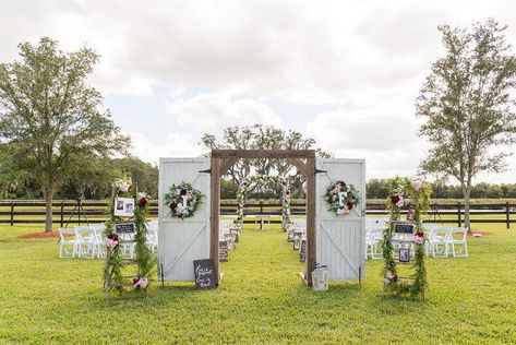 Barn Door Wedding, Barn Door Gate, Chic Wedding Ceremony, White Folding Chairs, City Wedding Venues, White Barn Door, Wedding Ceremony Decor, Wedding Doors, Romantic Outdoor Wedding