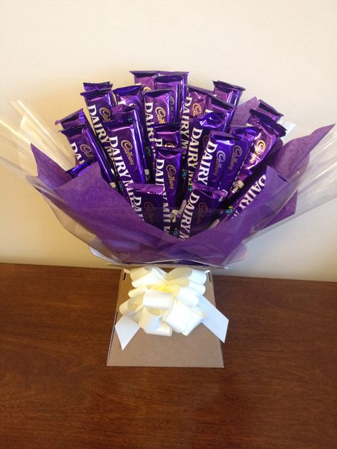 Cadburys chocolate dairy milk sweetie bouquet Dairy Milk Bouquet, Cadbury Milk Chocolate, Chocolate Flowers Bouquet, Sweet Hampers, Chocolate Bouquet Diy, Sister's Birthday, Candy Bouquet Diy, Chocolate Boxes, Sweet Trees