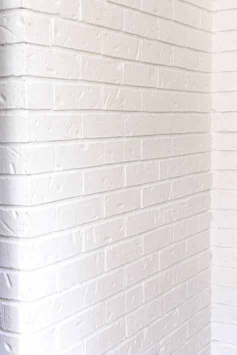 3 Easy Steps to Update Pre-painted Brick | Noting Grace Painted Brick Columns, Paint Brick White, Paint Brick Wall, How To Paint A Brick Wall, Painted Brick Bathroom Wall, How To Paint Brick Wall, White Painted Brick Interior Wall, Painting Brick Pavers, White Brick Basement Walls