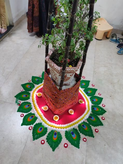 Tulsi pooja rangoli.. Rangoli Design For Tulsi Pot, Tulsi Border Rangoli, Rangoli Near Tulsi Plant, Rangoli For Tulsi Pooja, Tulsi Pooja Decoration, Tulsi Pooja Rangoli, Tulsi Vivah Decoration, Elegant Mehendi Designs, Diwali Lights Decoration House