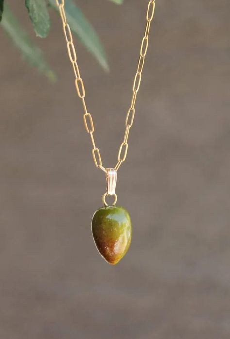 These handmade olives are amazingly realistic! They just look like the real ones in size and colors. These beads are carefully crafted from Italian glass. They are about 14 mm/.55. Single charm only can be purchase. Bail is 7.3 x 2.4 mm Metal: sterling silver 14k gold filled Chain can be customized. #olive #olivegreen #black #necklace #charm #murano #glass Olive Necklace, Pomegranate Earrings, Single Bead, Group Gifts, Olive Fruit, Green Olive, Intellectual Property, Olive Color, Glass Necklace