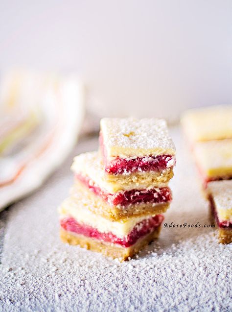 Easy Strawberry and Rhubarb Bars Recipe. Three layers of deliciousness: a crunchy base topped with a generous layer of sweet, fresh strawberries and rhubarb filling and finished off with a thick cream cheese batter. Rhubarb Bars Recipes, Rhubarb Filling, Strawberry Rhubarb Bars, Rhubarb Bars, Bars With Cream Cheese Frosting, Bars With Cream Cheese, Strawberry Bars, Rhubarb Recipes, Easy Strawberry