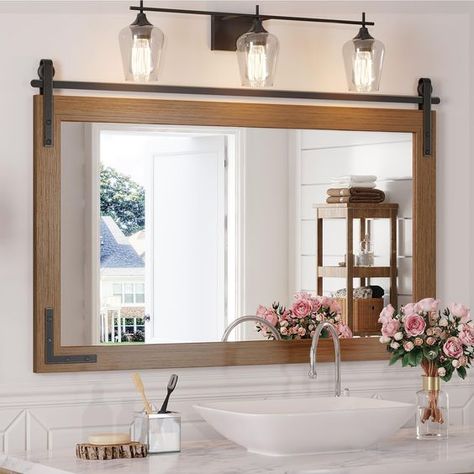 PRICES MAY VARY. Please Note: The overall size is 41 x 26 x 0.67 inches, and the display size of the glass mirror surface is 35.6 x 18.7 inches. The iron bracket hardware of the mirror’ top is non-sliding. It means that the mirror will not move left or right along the track. 【Rustic and Vintage Design】Mestikits farmhouse bathroom mirrors feature a classic style with a wooden frame enhanced by the small black metal details. The brown farmhouse style mirror is a perfect blend of rustic and modern, Round Wood Framed Mirror Bathroom, Farmhouse Mirrors For Bathroom, Farmhouse Bathroom Mirror Ideas, Mirrors For Bathroom Vanity, Rustic Bathroom Mirror, Living Room Courtyard, Wooden Bathroom Mirror, Wall Decor Mirrors, Rustic Bathroom Mirrors