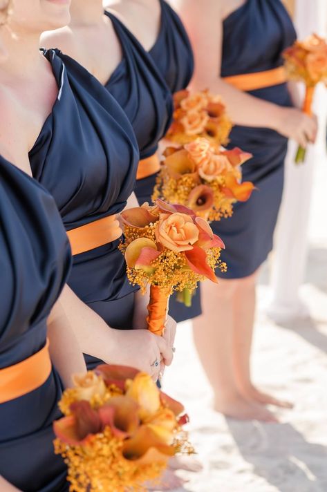 Uniform bridesmaids dresses. Cute color combo for fall. TIP: If you have two theme colors, get the bridesmaids dresses in a dark color and add your second color as a belt and accent with flowers. Like this blue and orange combo Blue Orange Weddings, Orange Wedding Themes, Burnt Orange Bridesmaid Dresses, Orange Wedding Colors, Fall Wedding Bridesmaids, Orange Bridesmaid, Fall Bridesmaids, Burnt Orange Weddings, Orange Bridesmaid Dresses