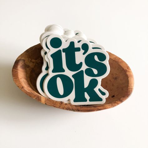 "There is a little mantra I like to tell myself when things start to feel overwhelming: it's ok, you're ok. You're doing this! Designed by me and printed in the US in a dark teal color with an off white background. Thick, durable vinyl protects stickers from scratches, water & sunlight. Perfect for water bottles, laptops, phone cases or your car. Measures approximately 3\" x 3\". Made in U.S.A." Sticker Inspo Aesthetic, Stickers Design Ideas, Branding Stickers, Sticker Cricut, It Stickers, Graphic Stickers, Stickers Packaging, Sticker Design Inspiration, Vinyl Sticker Design