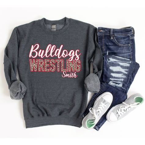 "Wrestling Sweatshirt, Custom Wrestling Mom Shirt, Leopard Wrestling Shirts for Women, Personalized Wrestling Sweater, Wrestler Mom Team Tees This custom wrestling sweatshirt is so soft, comfy & stylish and perfect to keep you warm and cozy while watching your favorite wrestler! HOW TO ORDER: Please leave the team\\mascot name, wrestler name (optional), and the font outline color you would like in the \"Add your personalization\" text box. Please message me if you have any questions before order Font Outline, Team Mom Shirt, Wrestling Mom Shirts, Team Shirt Designs, Wrestling Team, Sports Mom Shirts, Wrestling Shirts, Coach Shirts, Wrestling Mom