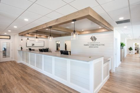 Scarborough Family Chiropractic hosts grand opening | Gawron Turgeon Architects Chiropractor Office Design, Orthodontic Office Design, Chiropractic Office Design, Front Desk Design, Doctor Office Design, Orthodontic Office, Dentist Office Design, Medical Office Decor, Dental Office Design Interiors