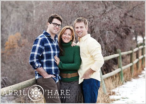 A portrait of a beautiful lady with red hair and wearing a green sweater poses with her two adult sons next to the entrance of the McClintock Trail at Chautauqua Park in Boulder Colorado at her winter family photo session. Mother Son Poses, Sibling Photography Poses, Mother Son Photos, Son Photo Ideas, Winter Family Photos, Colorado Boulder, Family Photoshoot Poses, Sibling Poses, Family Portrait Poses