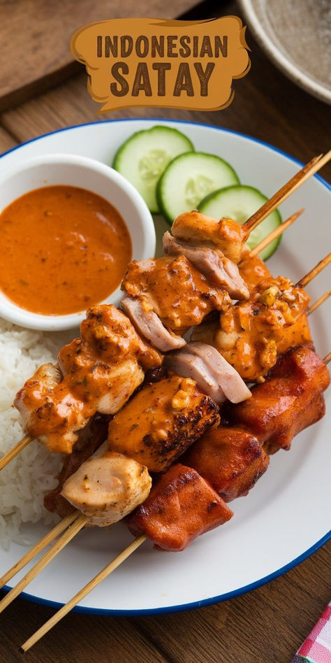 Indonesian Satay: tender, marinated meat skewers grilled to perfection and served with a rich, creamy peanut sauce. A taste of Indonesia at home! Indonesian Satay, Satay Recipe, Meat Skewers, Indonesian Recipes, Marinate Meat, Skewers Grill, Peanut Sauce, Indonesian Food, Skewers