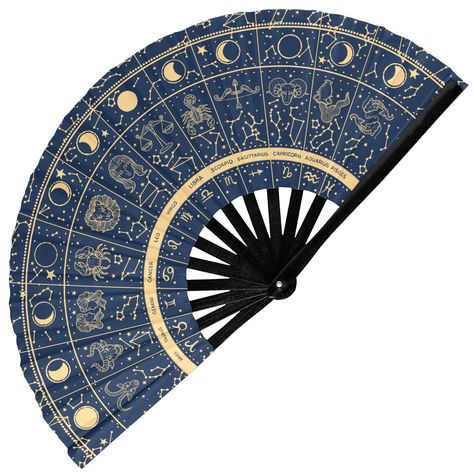 PRICES MAY VARY. CELESTIAL ZODIAC DESIGN: Add cosmic flair to your ensemble with our GloFX Rave Fan featuring intricate designs of the zodiac signs. Whether you're showcasing your astrological identity or simply admiring the stars, this fan is a captivating accessory for festival outfits, EDM raves, and cosmic-themed events. PREMIUM QUALITY CRAFTSMANSHIP: Crafted with durable bamboo ribs and Oxford fabric, our large folding hand fan ensures durability and longevity. Its sturdy construction makes Celestial Furniture, Celestial Centerpieces, Celestial Wedding Centerpieces, Festival Outfits Edm, Astrology Themed Party, Astrology Wedding, Moon Wedding Theme, Celestial Home Decor, Fan Holder