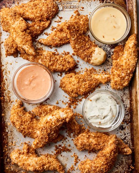 Crispy Baked Chicken Tenders | Kitchn Oven Baked Chicken Tenders, Crispy Oven Baked Chicken, Crispy Chicken Tenders, Baked Chicken Tenders, Crispy Baked Chicken, Oven Fried Chicken, Family Friendly Dinners, Creamy Dip, Oven Chicken