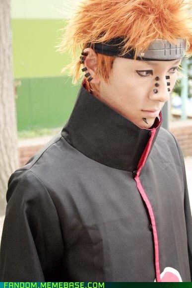 Pein cosplay from Naruto...I hope those piercings aren't real, or else he's having Pein pains! (I know, I know...bad pun...) Pein Naruto, Pain Cosplay, Leaf Village Headband, Three Piercings, Gaara Cosplay, High Nostril Piercing, Akatsuki Cosplay, Forehead Headband, Naruto Clothing