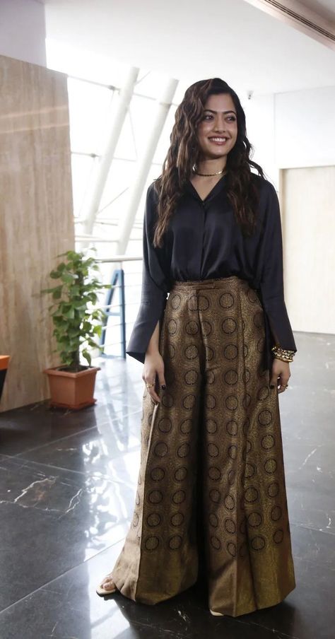 rashmika mandanna in black top palazzo by payal khandwala at sita ramam trailer launch Pallazo Suits Indian Casual, Brocade Pants With Top, Palazzo Saree, Bollywood Style Semi-stitched Dola Silk Palazzo Set, Diwali Party Outfit, Festive Black Silk Palazzo Set, Traditional Brocade Palazzo Set For Diwali, Festive Brocade Palazzo Set, Black Silk Palazzo Set With Resham Embroidery