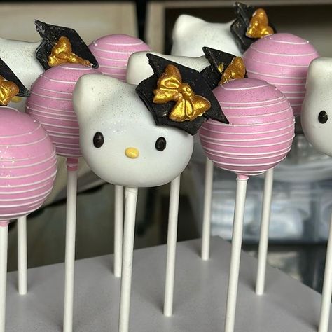 Karina Toscano on Instagram: "Hello Kitty Graduation Pops 🖤💗 • • • #hellokitty #hellokittylover #hellokittycore #hellokittyaddict #sanrio #graduation #grad #gradszn #congrats #congratulations #graduationcakepops #cakepops #cakepopsofinstagram #cakepopstagram #baking #baker #smallbusiness #losangeles" Grad Hello Kitty, Hello Kitty Graduation Party Ideas, Hello Kitty Graduation Cakes, Hello Kitty Graduation Party, 2027 Graduation, Sanrio Graduation, Hello Kitty Cake Pops, Hello Kitty Graduation, Graduation Cake Pops