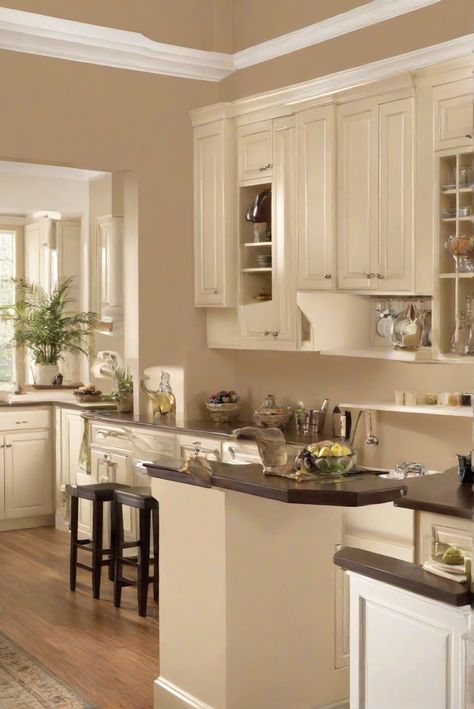 interior wall paint, bathroom paint colors, paint color for bedroom, kitchen wall color Tan Walls Kitchen, Tan Kitchen Walls, Manchester Tan Benjamin Moore, Tan Kitchen, Manchester Tan, Warm Neutral Paint Colors, Light Oak Floors, Tan Walls, Kitchen 2024