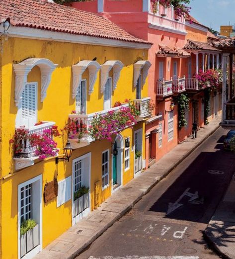 The architecture of Colombia is a stunning blend of colonial charm and modern innovation. ⁠ ⁠ Cartagena is a perfect example of this fusion. In the historic walled city, you'll find brightly painted houses in shades of deep blues, yellows, and ochres that reflect the vibrant Caribbean sun⁠ ⁠ The colonial-era buildings, with their thick stone walls, are adorned with intricate wooden balconies, often overflowing with bougainvillea. These balconies were once a symbol of status during the Spanish... Colombia Houses, Bougainvillea Painting, Spanish Colonial Architecture, Caribbean Architecture, Painted Houses, Painting House, Walled City, Colonial Architecture, Stone Walls