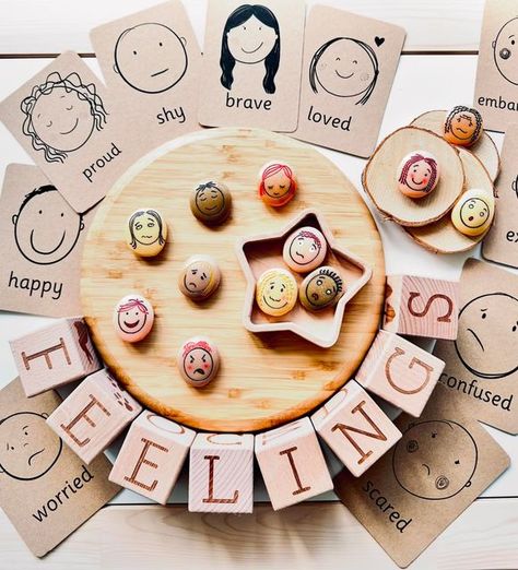 ⭐️✨Ila’s Montessori Tiney Home Nursery✨⭐️ on Instagram: "⭐️ EMOTIONS ⭐️  How are you feeling today?    Talking about how children are feeling and for children to have the confidence to express their emotions is such a valuable life skill. Emotion flashcards & stones are an ideal resource for little ones and a great way to help your toddler recognise and understand their big feelings. The Colour Monster book is brilliant to learn all about different emotions. @amazonuk @thecolourmonster_official   Resources :  Yellow Door Emotion stones & wood slices from @little_acornsuk  Use code ILAS_MONTESSORI to SAVE   Emotion flashcards & star sensory play tray  from @thelittlecoachhouse  Wooden blocks from @little_stories_uk   #littleacornsrep#eyfs#emotions#bigfeelings#eyfsactivities#eyfslearning#chi Emotional Development Activities, Emotions Activities, Monster Book Of Monsters, Social Emotional Development, Different Emotions, Emotional Development, Reggio Emilia, Montessori Activities, Sensory Play