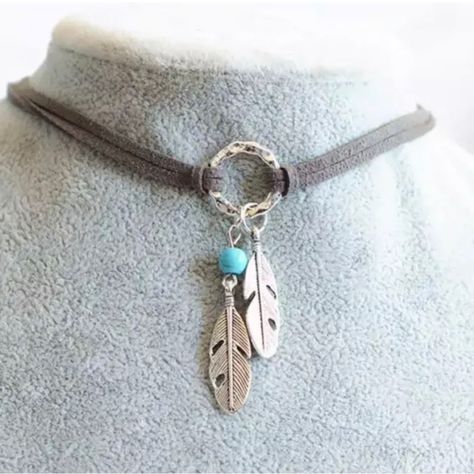 Soft Leather Choker Necklace With Silver Circle Center. Two Small Silver Feathers And A Turquoise Bead Accent The Necklace. A Little Bit Boho, A Little Bit Western. Adjustable To Fit Most Any Size Neck. 17.5” Long With 2” Extender. Feather Pendant Necklace, Charm Choker Necklace, Leather Choker Necklace, Turquoise Leather, Fashion Bohemian, Feather Pendant, Silver Feather, Costume Jewelry Necklaces, Black Choker