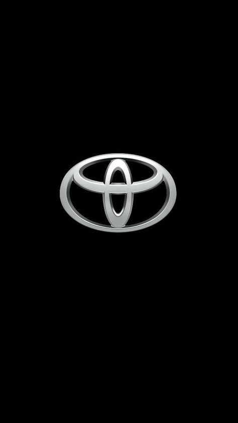 Toyota logo silver color with black background. Toyota Supra Rz, Classic 350 Royal Enfield, Toyota Emblem, Luxury Car Logos, Cool Truck Accessories, Mercedes Wallpaper, Logo Wallpaper Hd, Toyota Supra Mk4, Toyota Innova