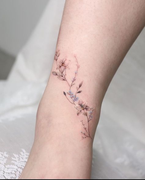 Flower Vine Tattoos For Women, Elegant Tattoos For Women Classy Simple Beautiful, Flowers Wrist Tattoo, Classy Tattoos For Women Elegant, Watercolor Floral Tattoo, Flower Bracelet Tattoo, Floral Wrap Around Tattoo, Flower Wrist Tattoo, Delicate Feminine Tattoos