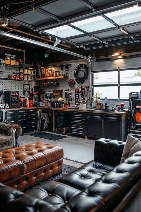 Clean, robust, and impressive – masculine interior design has always been a source of bold interiors. However, more than moody hues and strong materials, the comfort and practicality of this style make it suitable for any room of the house. So, if this dramatic look catches your eye, read on for expert ideas and inspiration on creating masculine interiors throughout your home! Big Garage Interior, Auto Repair Shop Reception Areas, Garage Office Design, New Age Decor, Welding Shop Ideas Garage, Garage Cave Man Ideas, Basement Garage Ideas, Industrial Garage Ideas, Unique Garage Ideas