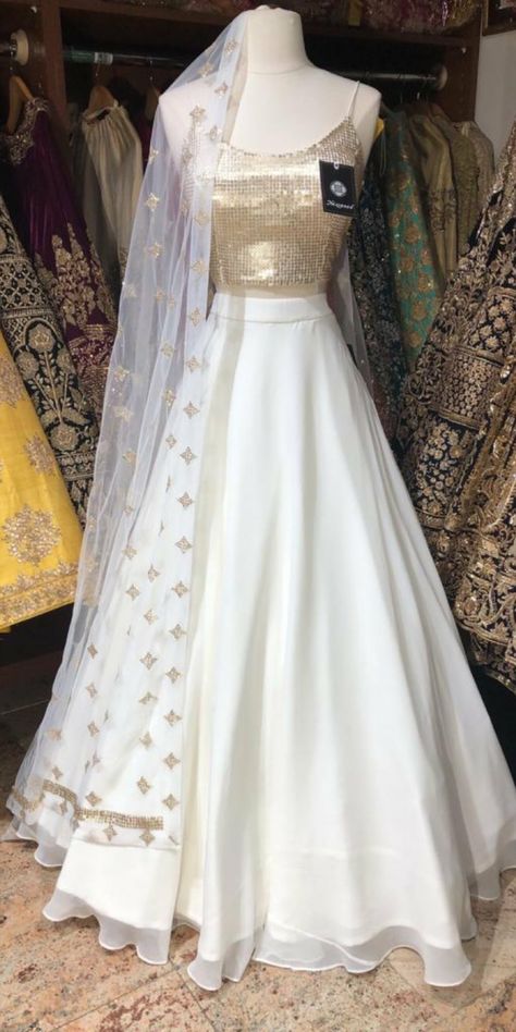 @raashik99 White Chiffon Lehenga, Feather Lehenga, Ivory Bridal Lehenga, White Lengha, Chiffon Lehenga, New Year Fashion, Flared Lehenga, White Lehenga, Spagetti Strap