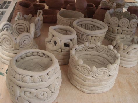 Grade 10 students made coil vessels for their clay unit. I demonstrated various methods of building the vessels: using coils, spirals, ball... Coil Building Ceramics Clay Projects, Coil Pots Aesthetic, Coil Pots Ideas Easy, Ceramics Projects High School, Coil Vessels, Coil Pot, Clay Lesson, Coil Pottery, Coil Pots