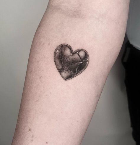 Cracked stone heart 💔 chosen from one of my flash sheets. For @makinzeehall. Thanks for coming. It was a good time 😊 - Link in bio to book - #tattoo #blackandgreytattoo #realismtattoo #brokenhearttattoo #hearttattoo #stonetattoo #brokentattoo #crackedheart #blackandgreyrealism #denvertattoo #denvertattooartist #realistictattoo #tattooartist #tattoos #microrealism #fineline Stone Tattoo, Flash Sheets, Clay Heart, Book Tattoo, Thanks For Coming, Realism Tattoo, Stone Heart, Heart Tattoo, Black And Grey Tattoos