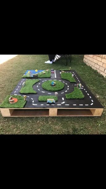 Diy Backyard Car Track, Pallet Car Track, Outdoor Race Track For Kids, Car Tracks For Kids Diy, Car Track Diy, Outdoor Car Track For Kids, Race Track Diy, Backyard Clubhouse, Daycare Setup