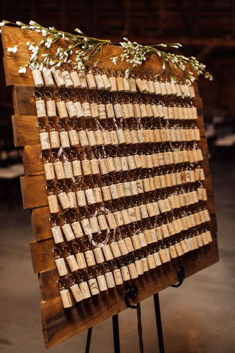 Wine Cork Wedding Ideas Diy, Engagement Cork Keepsake, Cork Decorations Wedding, Wine Cork Table Decor, Wine Events Ideas, Wine Cork Centerpiece Wedding, Cork Wedding Decor, Wine Cork Seating Chart, Wedding Corks Ideas