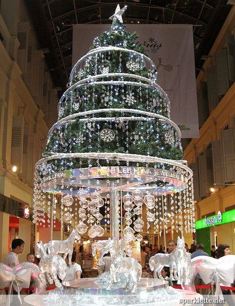 Image result for carousel christmas tree Christmas Lights Inside, Christmas Booth, Christmas Tree Images, Jeweled Christmas Trees, Fiber Optic Christmas Tree, Jeweled Christmas, Jewelry Christmas Tree, Creative Christmas Trees, King Power