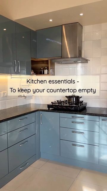 Saavi Design Studio on Instagram: "Kitchen essentials: For this kitchen renovation, the space was a major constraint, due to the presence of certain additional appliances like Flour Grinder etc, causing inconvenience in operating the Kitchen. Hence, the main aim for this kitchen design was to keep the countertop empty at all times and create storage spaces for all equipments, making it functional and super easy to operate. A big thank you to our client @devikondoju for showing us how these Indian Kitchen Design Ideas With Black Countertop, Indian Kitchen Countertops, Wet Grinder Storage Ideas In Kitchen, Matka Stand In Kitchen, Indian Kitchen Countertops Organization, Indian Kitchen Pantry Design, Kitchen Interior Indian, Flour Grinder, Indian Kitchen Interior