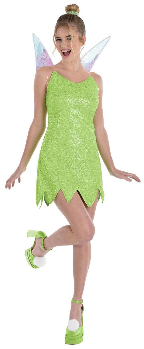 PRICES MAY VARY. Pixie's Charm: Party City's Adult Tinker Bell Costume lets you flutter into the night with a sprinkle of magic. The ensemble includes a glistening dress, translucent wings, and magical accessories, whisking you away to a land of fantasy and wonder. Size M. Detailed Design: The costume set features a shimmering dress, delicate wings, and two pom-pom shoe clips for an extra touch of Tink's signature style. The included hair clip adds a finishing touch to your enchanting look. Vers Homemade Tinkerbell Costume, Tinkerbell Costume Adult, Tinkerbell Halloween Costume, Halloween Birthday Parties, Bell Costume, Shimmering Dress, Tinkerbell Costume, Charm Party, Tinker Bell Costume