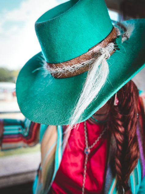 Cowgirl with turquoise cowboy hat tipped down showing a turquoise and rose gold hat band. Colored Cowboy Hats, Colored Felt Cowboy Hats, Turquoise Cowboy Hat, Turquoise Cowgirl, Cowboy Hat Band, Turquoise Hat, Punchy Outfits, Custom Cowboy Hats, Felt Cowboy Hat