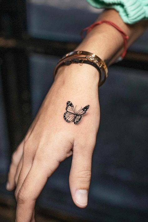 Small Butterfly Tattoo On Hand, Butterfly Tattoos Design, Small Butterfly Tattoos, Butterfly Tattoos On Arm, Thumb Tattoos, 3d Butterfly Tattoo, Tattoo Design For Hand, Butterfly Hand Tattoo, Butterfly Wrist Tattoo