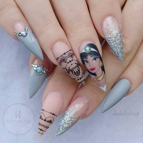 stiletto-nails-simple-nail-designs-jasmine-disney-inspired-manicure-blue-matte-glitter-black-nail-polish-jasmine-drawing Jasmine Nails, Disney Acrylic Nails, Nail Art Halloween, Unghie Nail Art, Unicorn Nails, Nail Art Disney, Disney Nails, Princess Jasmine, Unique Nails