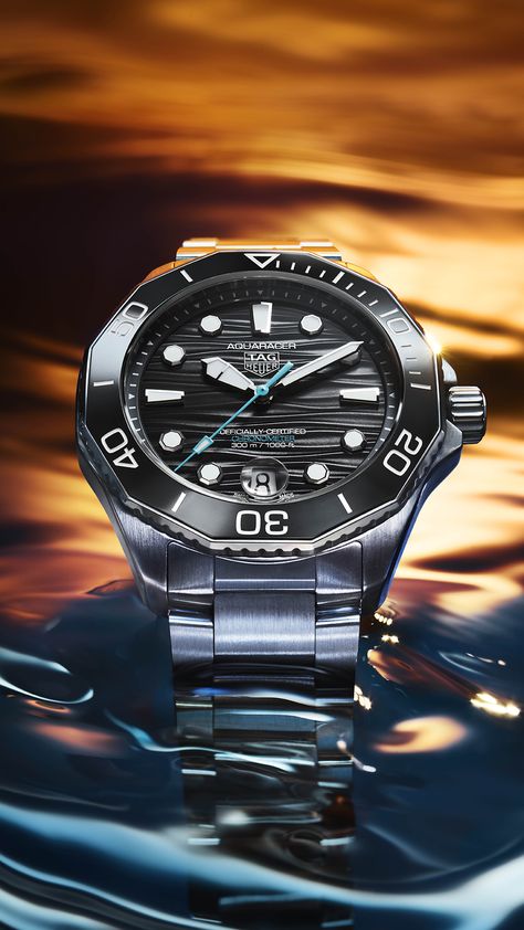 TAG Heuer has just unveiled updated versions of the Aquaracer Professional 300 Date & GMT. These revisions include subtle changes to the dial, a new smaller 42 mm case and the inclusion of a far superior COSC-certified movement. Angus Davies takes a deep dive into the latest subaquatic models.  #TAGHeuer #Aquaracer #Chronometer #DiversWatch Tag Heuer Aquaracer Professional 300, Tag Heuer Aquaracer, Seek Adventure, Tag Heuer Watch, Divers Watch, Watch Review, Small Case, Fine Watches, Tag Heuer